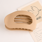 Velmora™ Minimalist Oval Hair Claw Clip – Strong Hold for All Hair Types